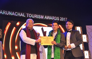 The Governor of Arunachal Pradesh Shri PB Acharya presenting awards on the   occasion of State Tourism Award function at IG Park Itanagar on 31st January2017.